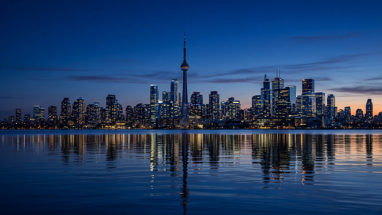 Toronto skyline across the harbour at dusk